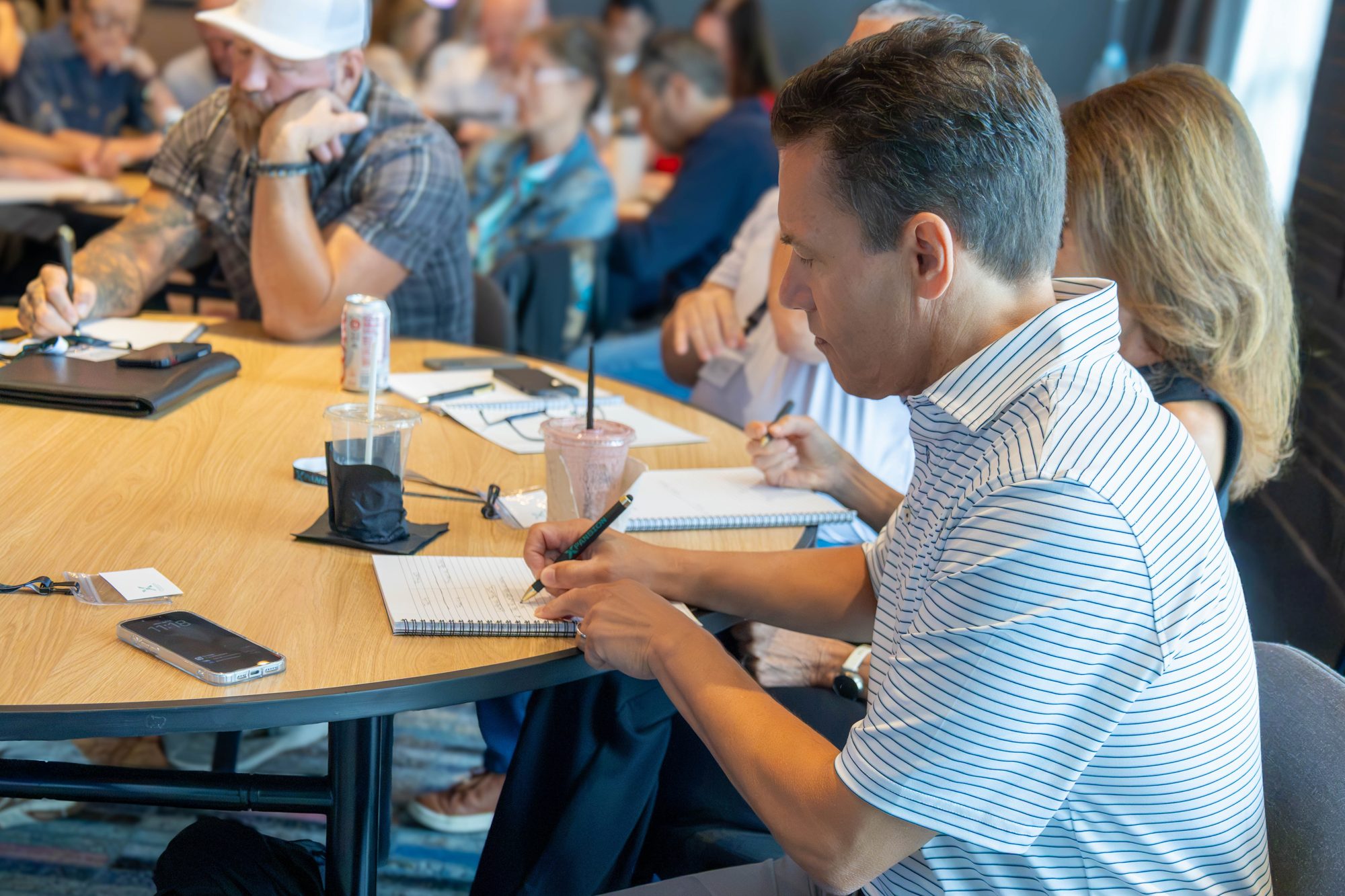 Attendees taking notes, XPANSION Nashville, July 2026
